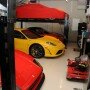 Ferrari and Porsche at Garage Photos